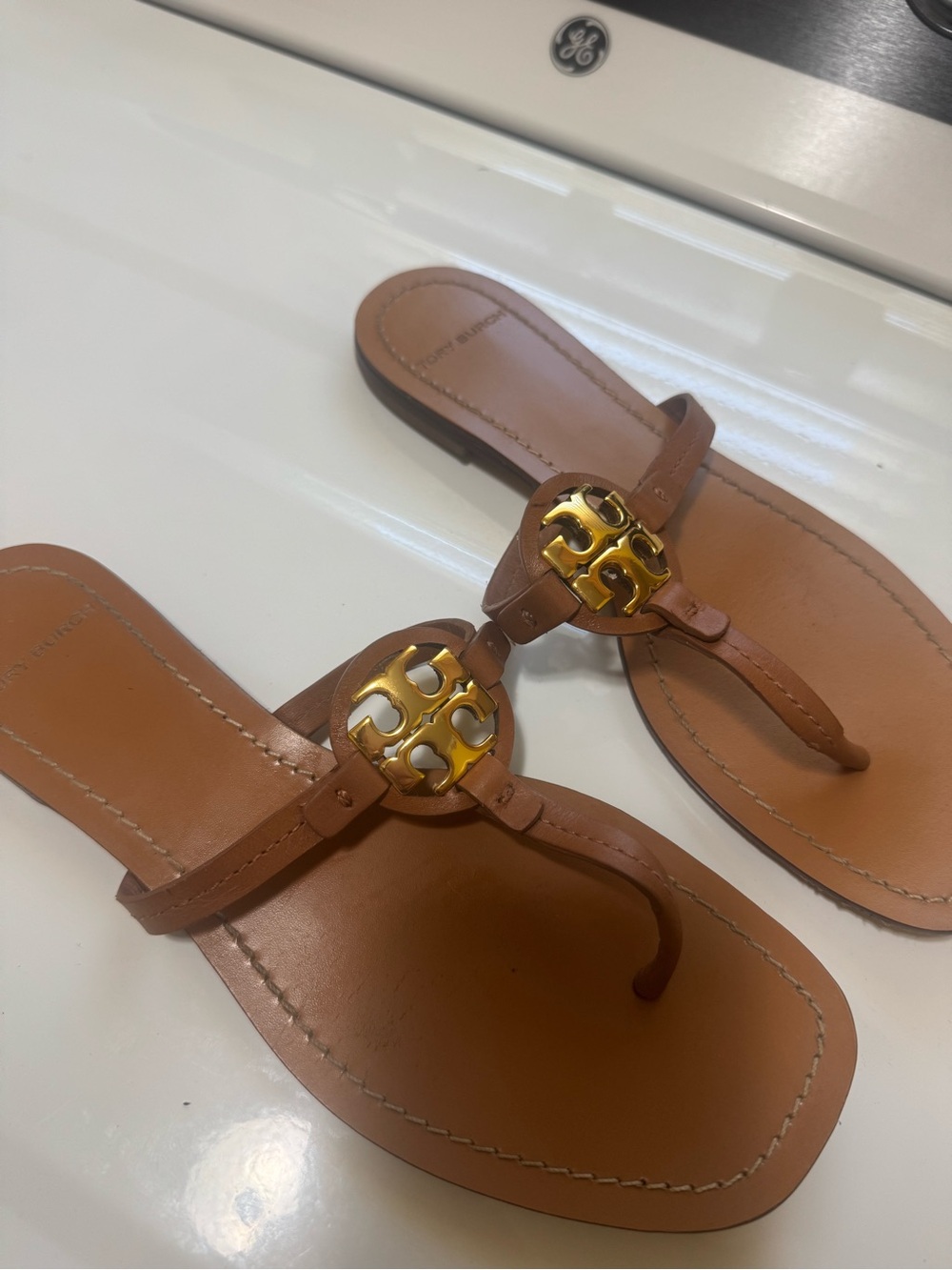 Tory Burch Tan Leather Thong Sandals with Gold Logo Medallion